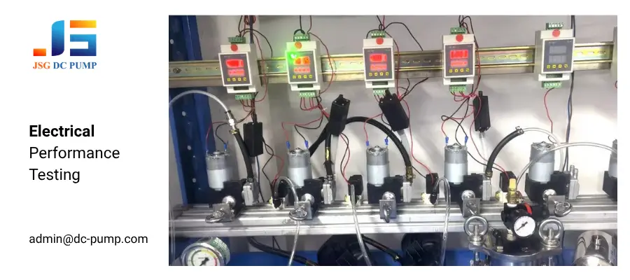 Multiple JSG micro pumps connected to electrical testing equipment for performance evaluation.