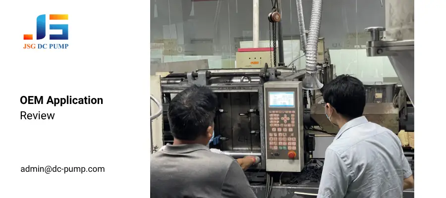 JSG engineers reviewing manufacturing equipment for OEM micro pump testing requirements.